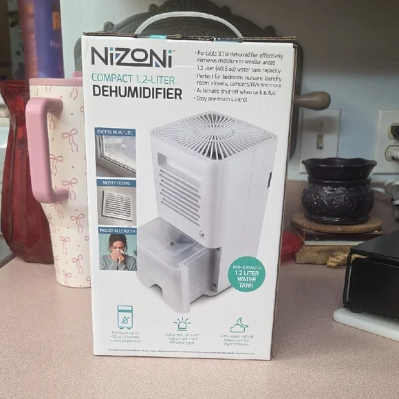 Compact 1.2-Liter White Dehumidifier - Picture 3 of 4